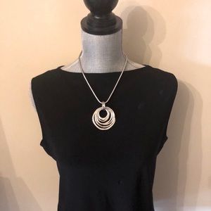 Silver tone circle necklace